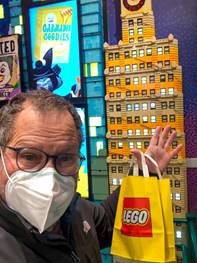 A picture containing text, person, person, indoor Description automatically generated